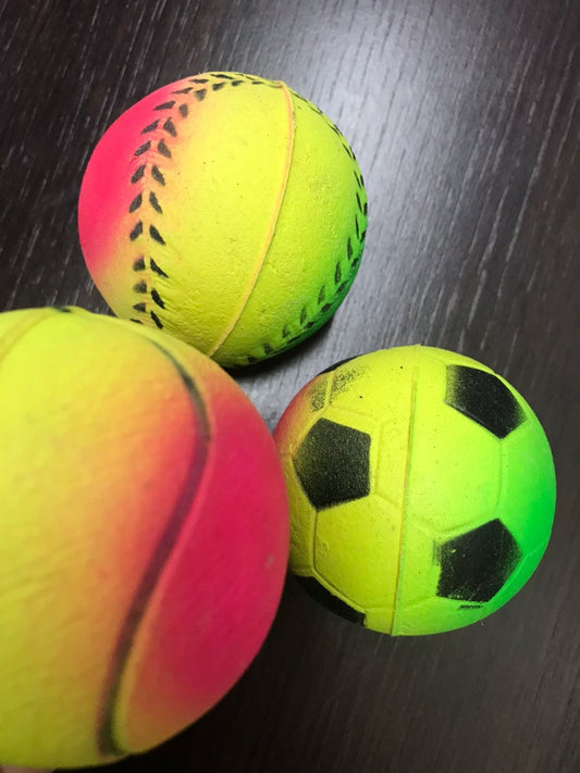 Rubber balls for dogs with designs