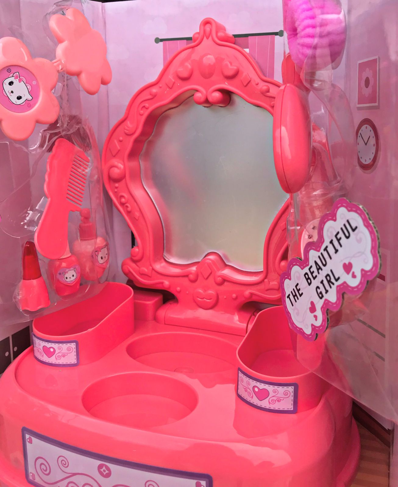 Baby with makeup vanity and accessories