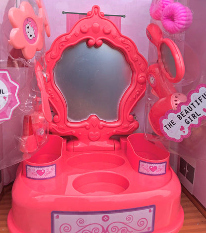 Baby with makeup vanity and accessories